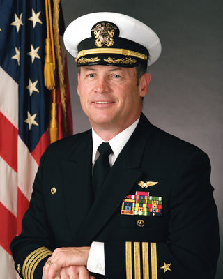 Captain Robert P. McClendon, USN (covered) | DPLA